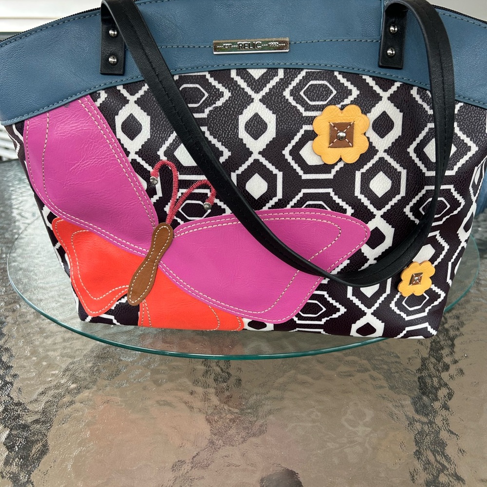 Relic Blue and Black Geometric Tote with Pink and Orange Butterfly